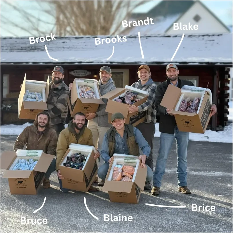 Seven Sons team holding boxes